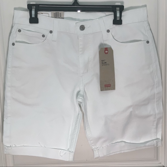 Levi's Pants - NWT Cute pair of white jean shorts these are a size 33.